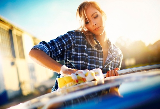 woman washing car