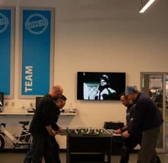 workers in room with custom prints