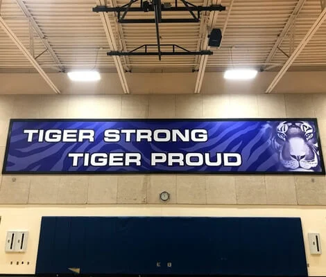 custom printed vinyl banner in school gym